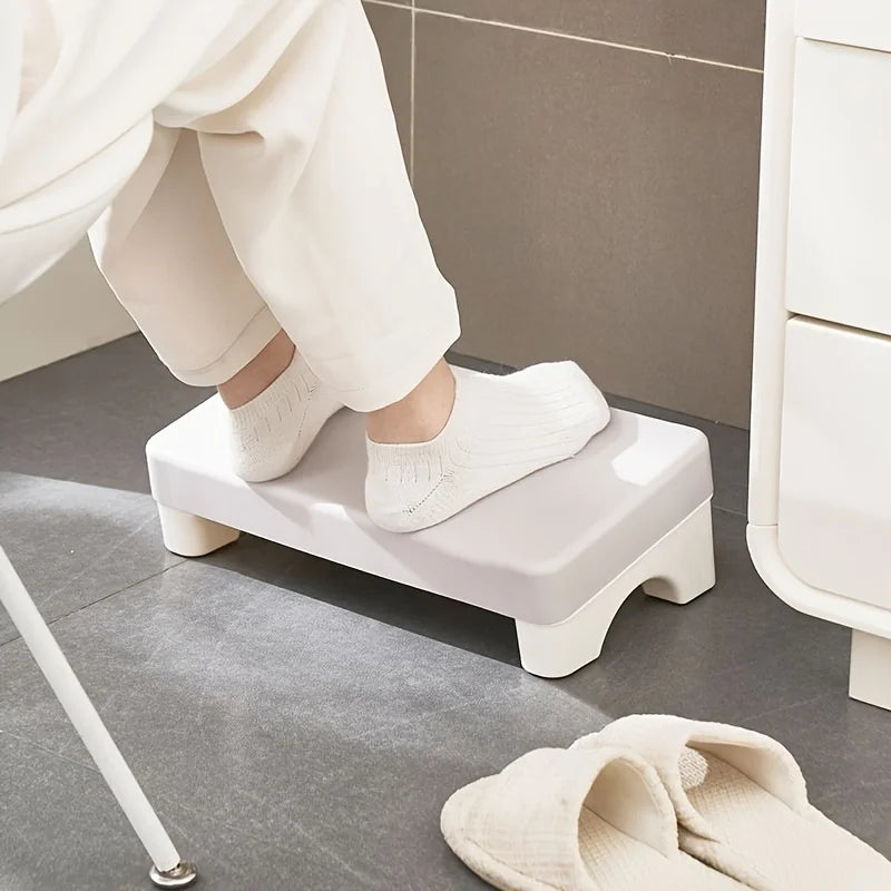 Repose-pieds ergonomique blanc en salle de bain - soutien plantaire pour un confort optimal et une meilleure posture