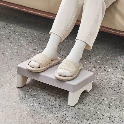 Repose-pieds ergonomique gris avec pantoufles - soulage la pression sur les jambes et améliore la posture au bureau